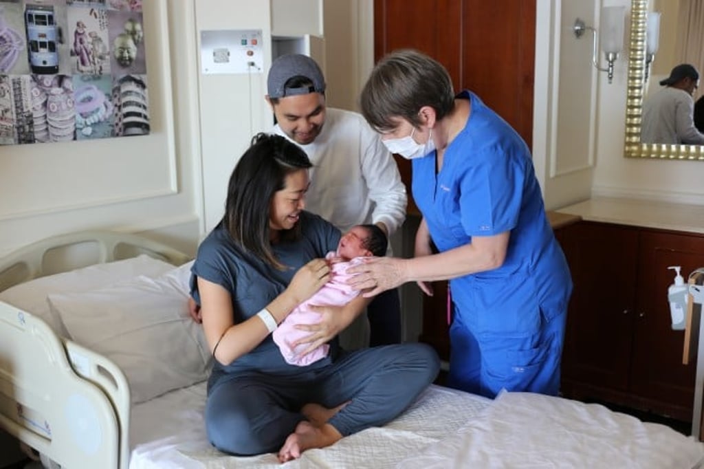 Midwives at Matilda offer breastfeeding support and help to look after Tiffany and Allan after they give birth to their second child at Matilda.
