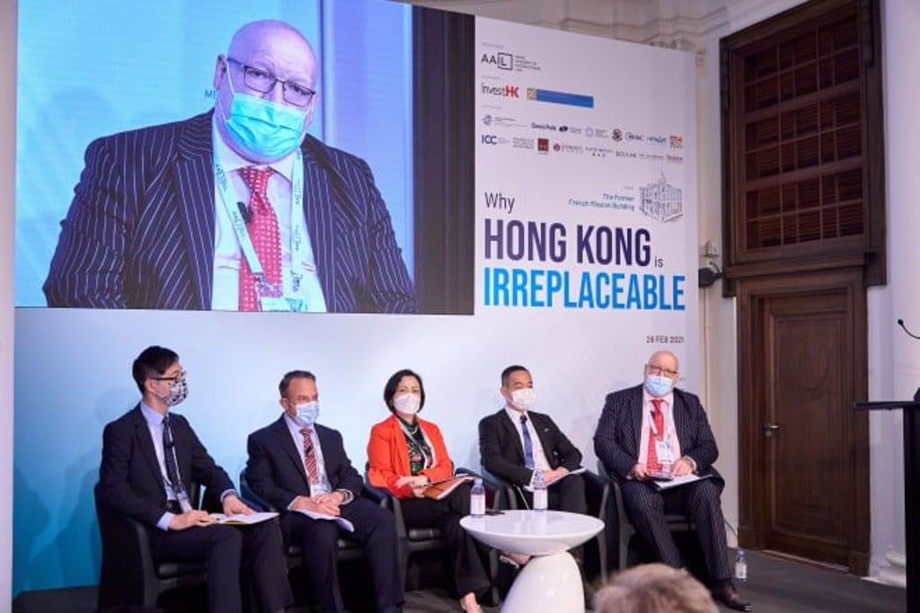 From left to right: Conrad Chan, Partner of Kwok, Yih & Chan; Paul Starr, Partner of King & Wood Mallesons, Carmen Kan, General Counsel of Bank of China (Hong Kong) Limited; Tommy Tong, Partner of Herbert Smith Freehills; and Martin Rogers, Partner & Chair (Asia) of Davis Polk discuss deal-making. From left to right: Conrad Chan, Partner of Kwok, Yih & Chan; Paul Starr, Partner of King & Wood Mallesons, Carmen Kan, General Counsel of Bank of China (Hong Kong) Limited; Tommy Tong, Partner of Herbert Smith Freehills; and Martin Rogers, Partner & Chair (Asia) of Davis Polk discuss deal-making.