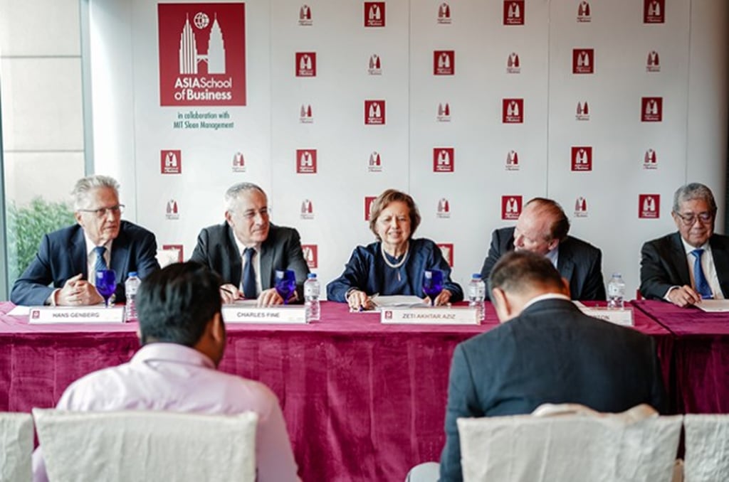 Hans Genberg, Senior Director of Central Banking and Finance Programs at ASB; Charles Fine, Founding CEO, President, and Dean at ASB; Dr. Zeti Akhtar Aziz, former governor for Bank Negara Malaysia and Group Chairman of Permodalan Nasional Berhad; Robert C. Merton, Professor of Finance at MIT, Nobel Prize Winner in Economics, and Co-chair of the Advisory Council for the Master of Central Banking; Eli Remolona, Director of Central Banking at ASB at a press conference for the launch of the Master of Central Banking program in 2020