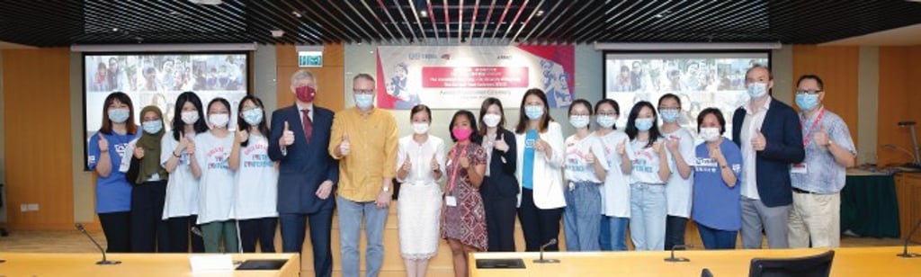 Winners from the secondary school section took a photo with Provost of CityU, Professor Christian Wagner (sixth from left); Head of AIS, Professor Mark Thompson (seventh from left); Associate Professor of AIS, Dr Justin Robertson (second from right); and representatives from Plan International at the award presentation ceremony held on 7 May 2021.