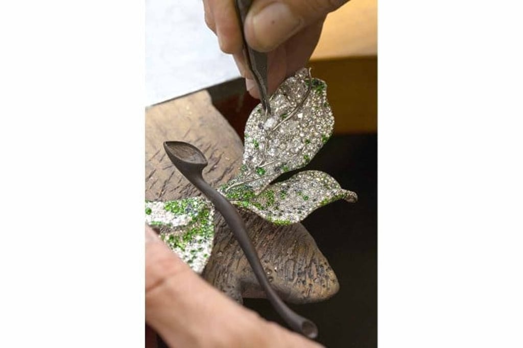 The Dragonfly Brooch is set with over 1,400 diamonds, juxtaposed with emeralds, tsavorites, greyish green sapphires, alexandrites and colour-change garnets.