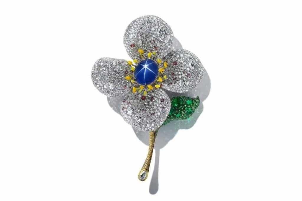 The Star Sapphire Floral Brooch comes in the shape of a four-leaf clover symbolising good luck.