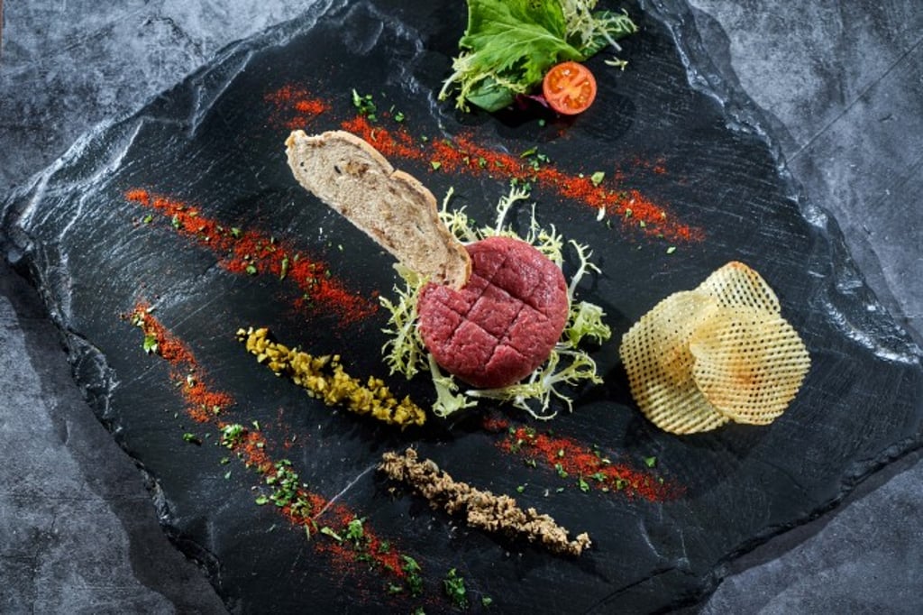 Steak tartare, one of the ever popular classic dishes, always on the bill of fare.