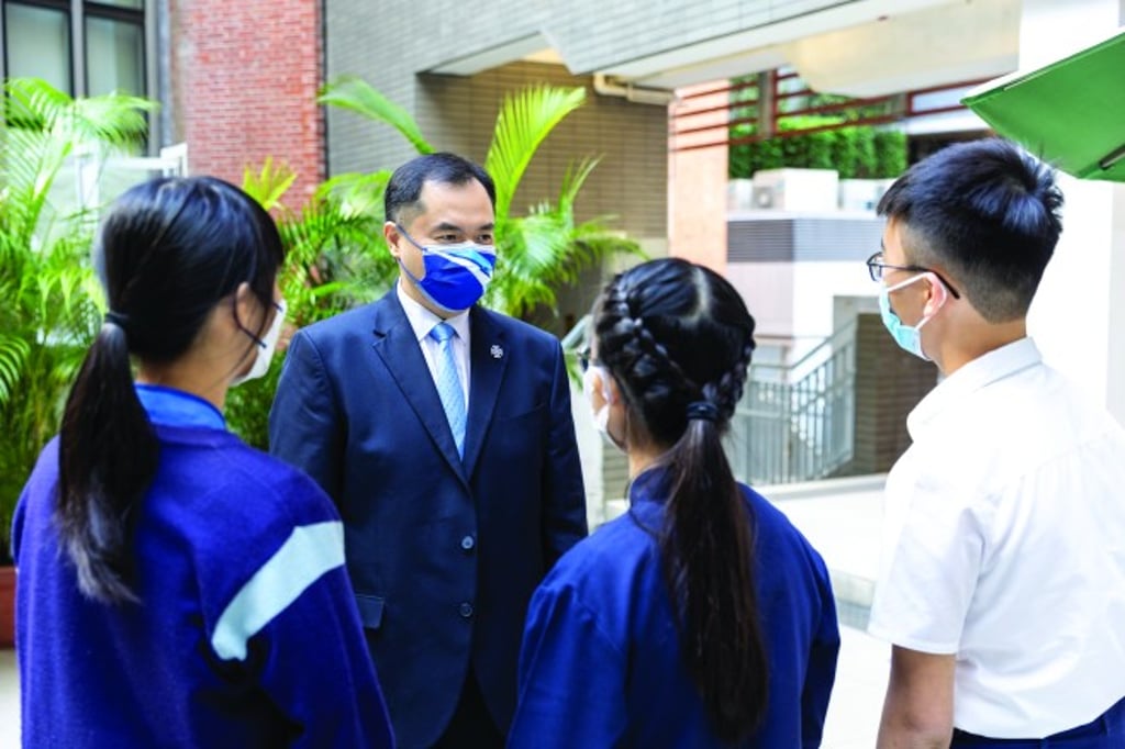 Poon chats with all members of the school, from students to janitors, to make sure their feelings and concerns are heard.