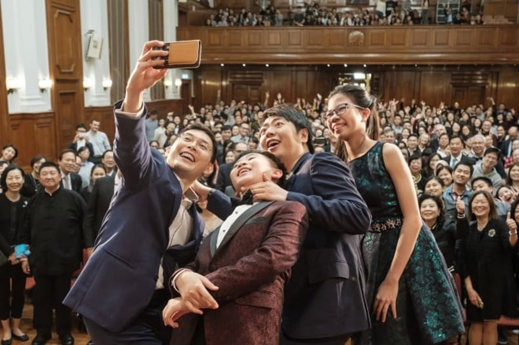 Professor Daniel Chua (left) with renowned pianist Lang Lang (second from right) in a ‘Music in Words’ conversation in 2017. © HKU MUSE Professor Daniel Chua (left) with renowned pianist Lang Lang (second from right) in a ‘Music in Words’ conversation in 2017. © HKU MUSE
