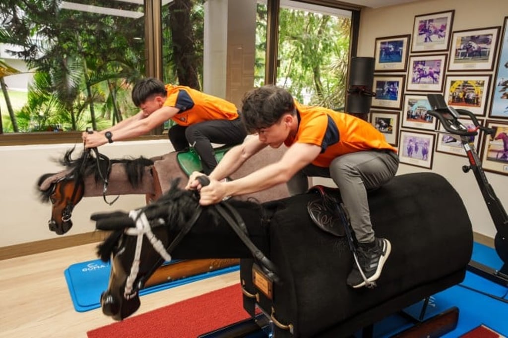 The Racing Trainees were practicing hard on the mechanical horses