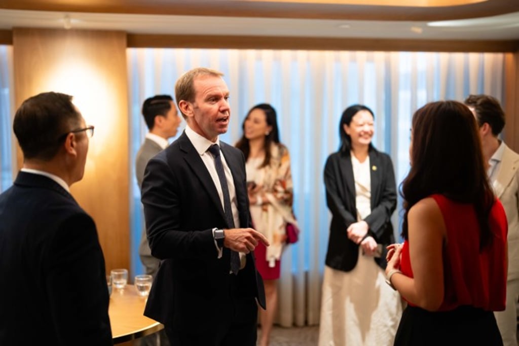 Stuart Woollford, head of group brand, AIA in discussion with other round table guests.