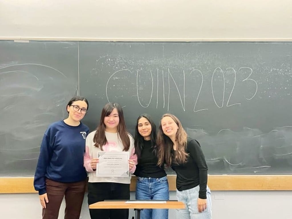 Chow proudly displayed her certificate of completion for the ESG Analyst Program.