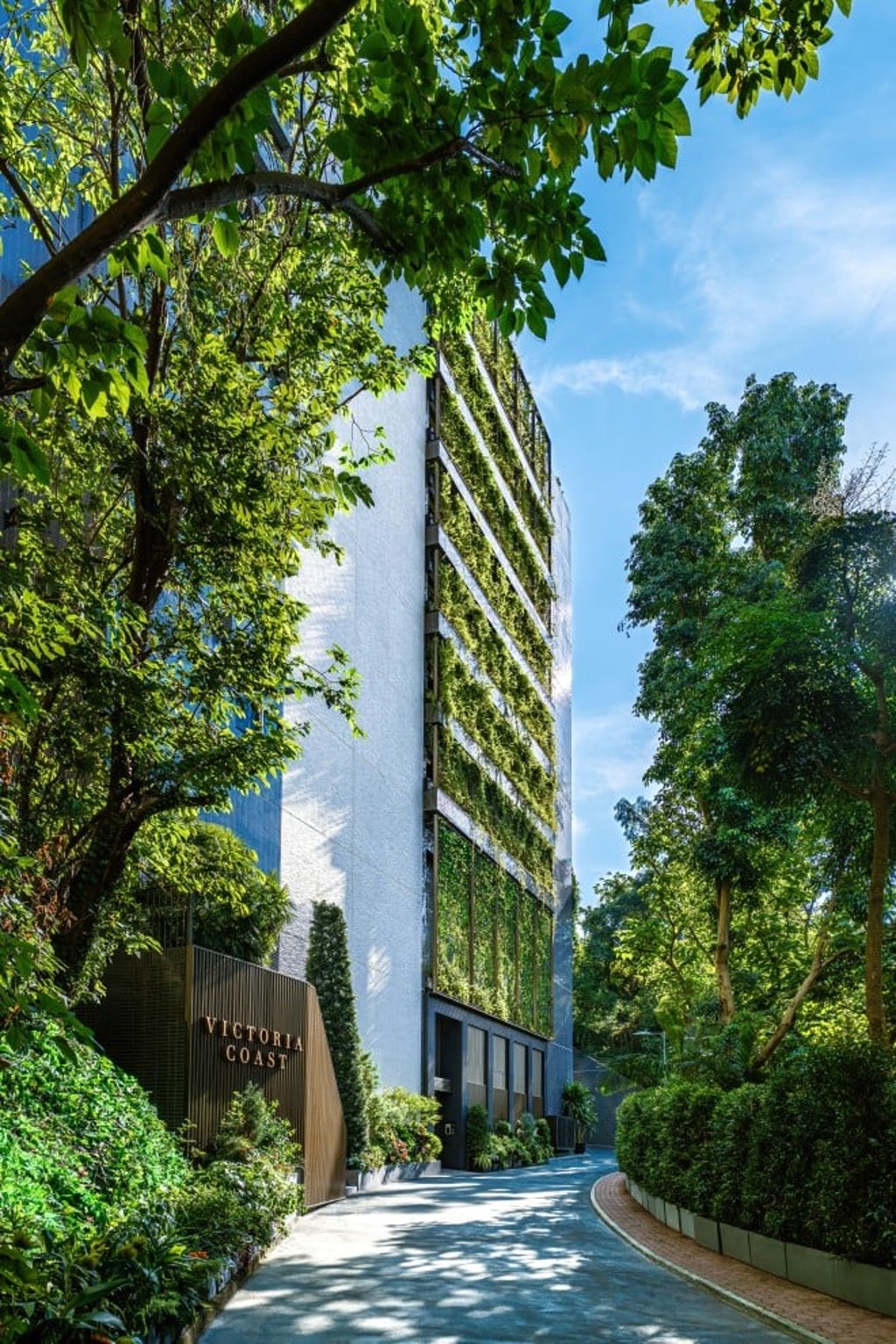 A magnificent landscaped green wall graces the driveway to Victoria Coast.