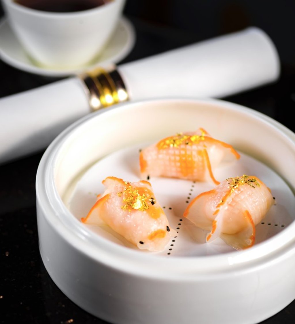 Savour over 40 varieties of dim sum in a luxurious setting adorned with exquisite Chinese silk and Suzhou embroidery at The 8.