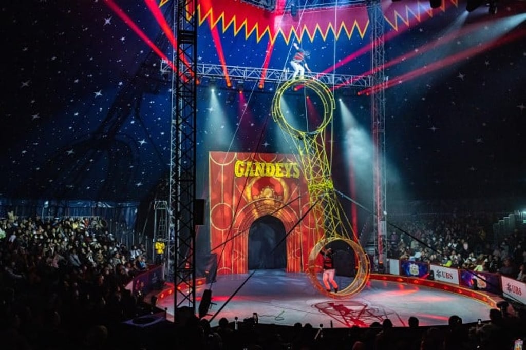 This year’s AIA Carnival included the Gandeys Circus performed inside the big top named “UBS presents The World Circus”. This year’s AIA Carnival included the Gandeys Circus performed inside the big top named “UBS presents The World Circus”.