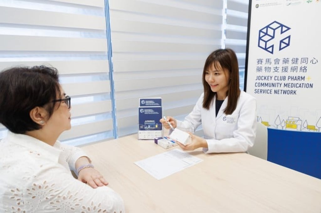 Jockey Club PHARM+ Community Medication Service Network beneficiary Kwan Shuk-yi (left) consults a pharmacist at one of the project community pharmacies.