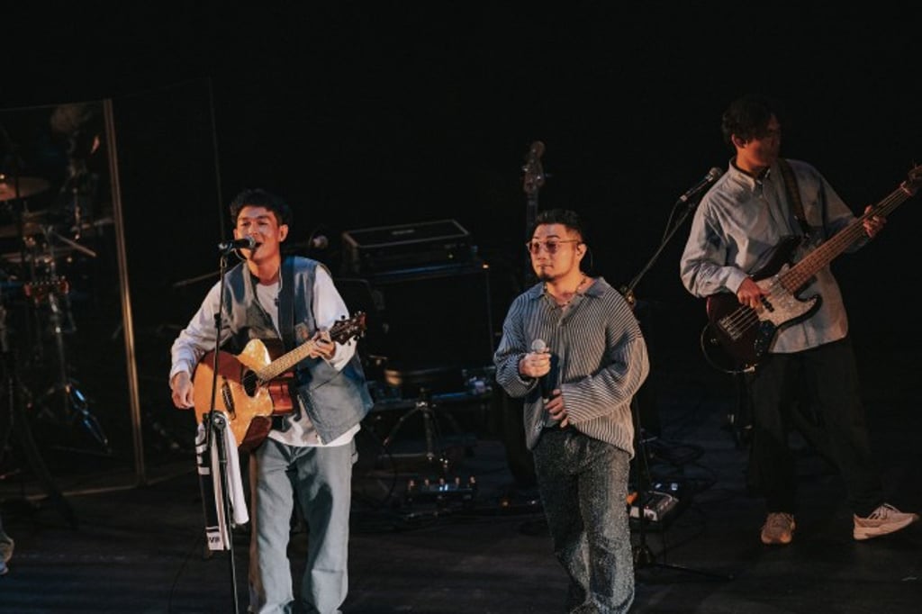 Monkey Sit (middle) performed with the Cantopop band Mover in the “Pop Kong” concert. Credit: 16th Productions Ltd