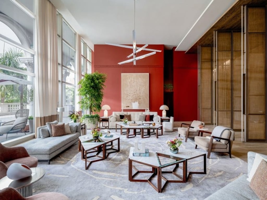 The AP House Macau’s Garden Lounge features high ceilings and floor-to-ceiling windows to bring the outdoors in.