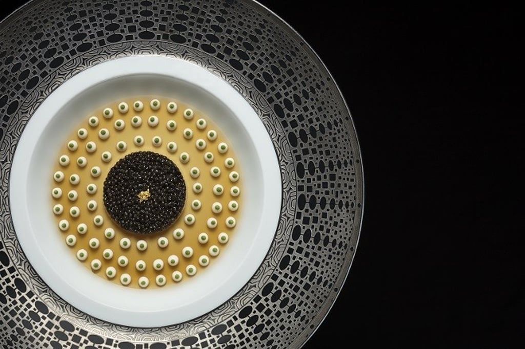 A masterpiece of precision and indulgence. Le Caviar at Robuchon au Dôme features Imperial Caviar and King Crab with Crustacean Jelly, showcasing the essence of haute cuisine.