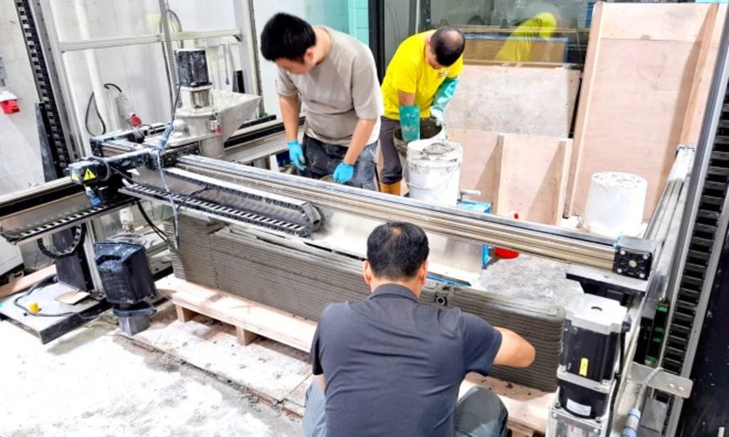 Low-carbon 3D concrete printing technology, which reduces carbon emission and further minimises construction waste through precise material application, paving the way for greener urban development in Hong Kong.