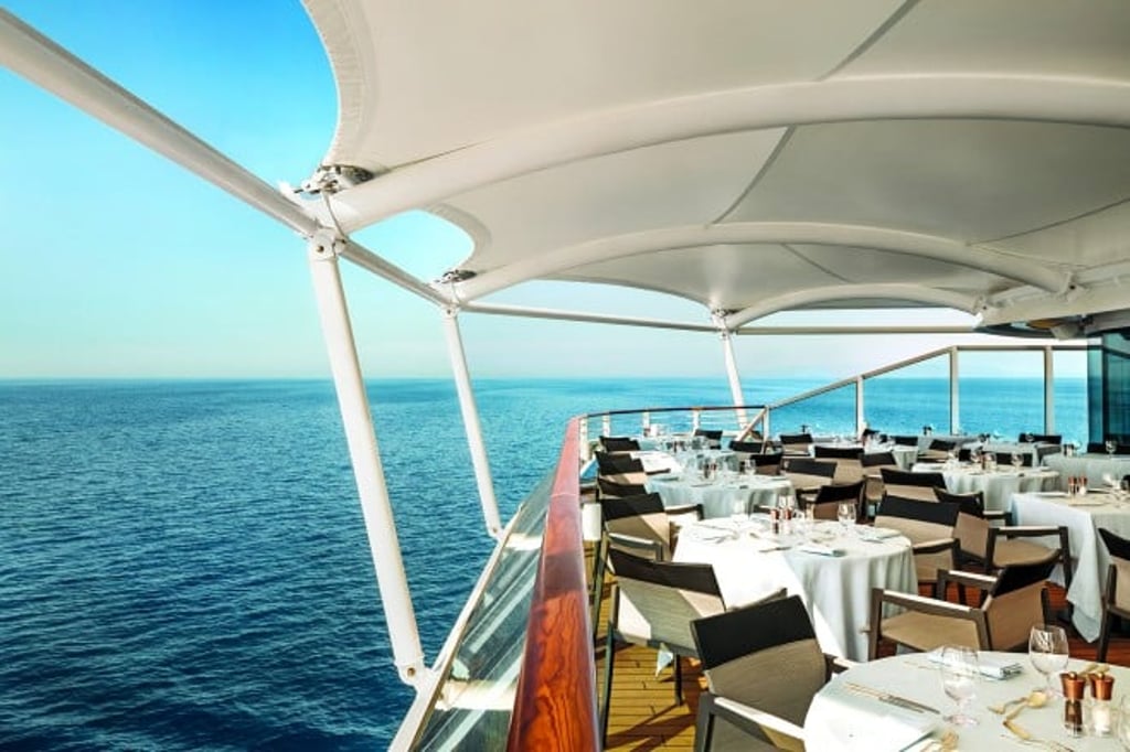 Guests can dine al fresco while taking in panoramic ocean views aboard. Guests can dine al fresco while taking in panoramic ocean views aboard.
