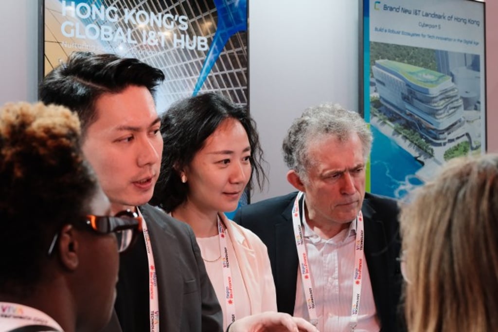 Yang Ming (centre), CEO of Westwell Holdings (Hong Kong) Limited, briefs visitors on the company’s port-automation solutions at VivaTech 2025 in Paris. Yang Ming (centre), CEO of Westwell Holdings (Hong Kong) Limited, briefs visitors on the company’s port-automation solutions at VivaTech 2025 in Paris.