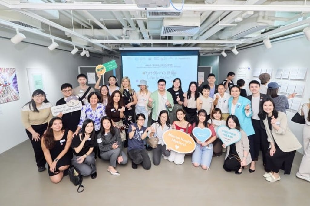 Visitors at the “More Than a Label” exhibition share their experiences and learn from real stories of people living with mental health conditions.