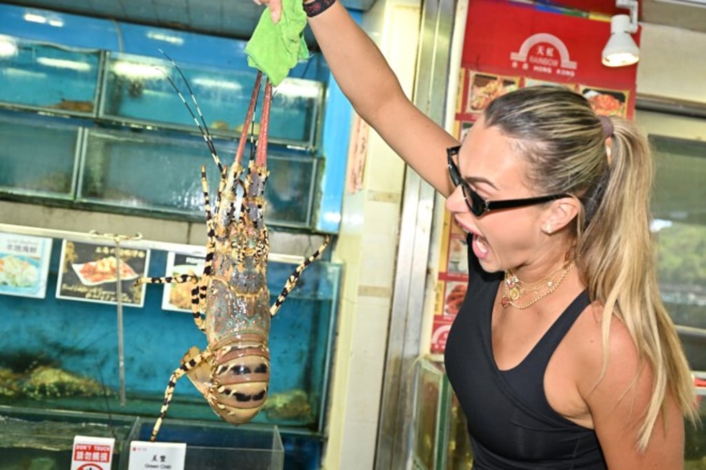 Aryna Sabalenka during a visit to a Hong Kong seafood market. The world No. 1 calls her first trip to the city “simply wonderful”.