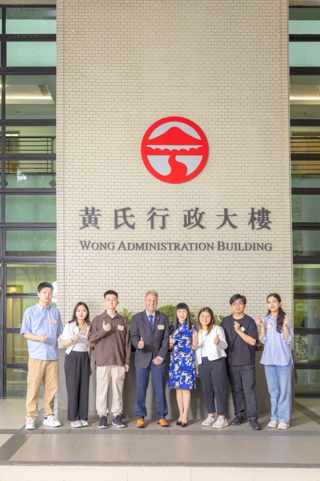 Lingnan University is committed to making its campus international. From left, Tang Kwan Yeung, Yona Yeung, Liu Duo, Professor Bradley Barnes, Special Advisor to President on Internationalization and Director of Global Education, Irene Ng, Director of Student Affairs, Fiona Lau, Alvis Cheung, and Seemi Nisar.