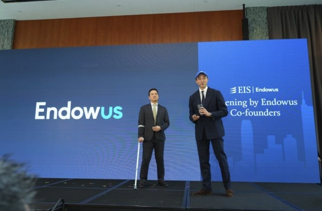 Endowus Co-Founders speak on stage at the Endowus Investment Summit in Hong Kong.