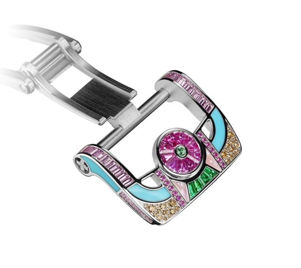 Gem-set craftsmanship is carried through to the buckle.