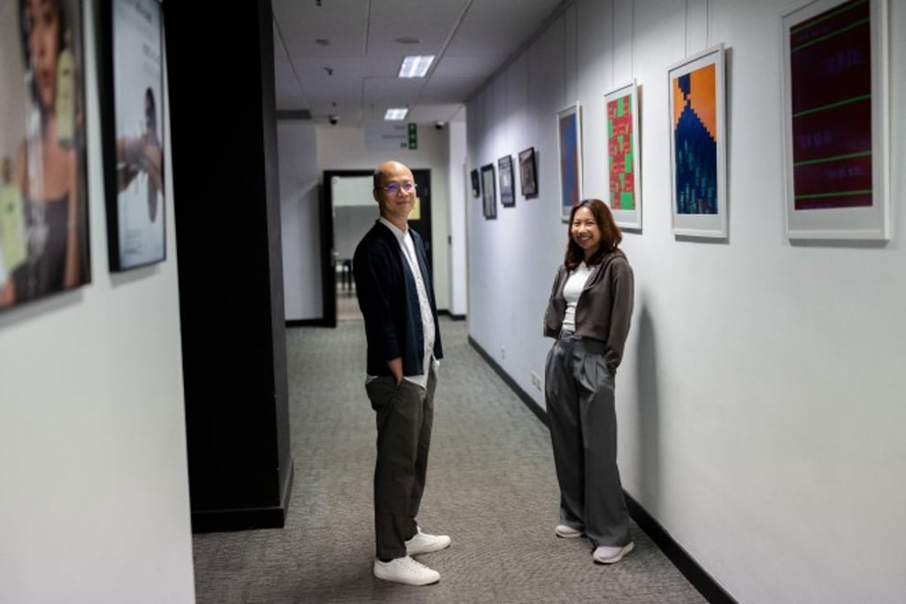 Dr Wong (left) is glad to see Chloe putting her classroom knowledge into practice.