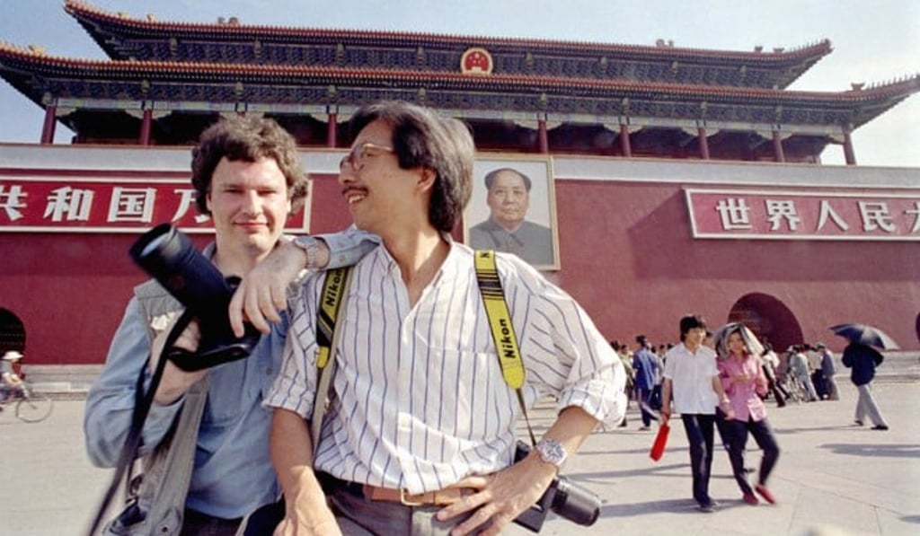 Jeff Widener (left) and fellow photographer Liu Heung Shing in Tiananmen Square before the crackdown. Jeff Widener (left) and fellow photographer Liu Heung Shing in Tiananmen Square before the crackdown.
