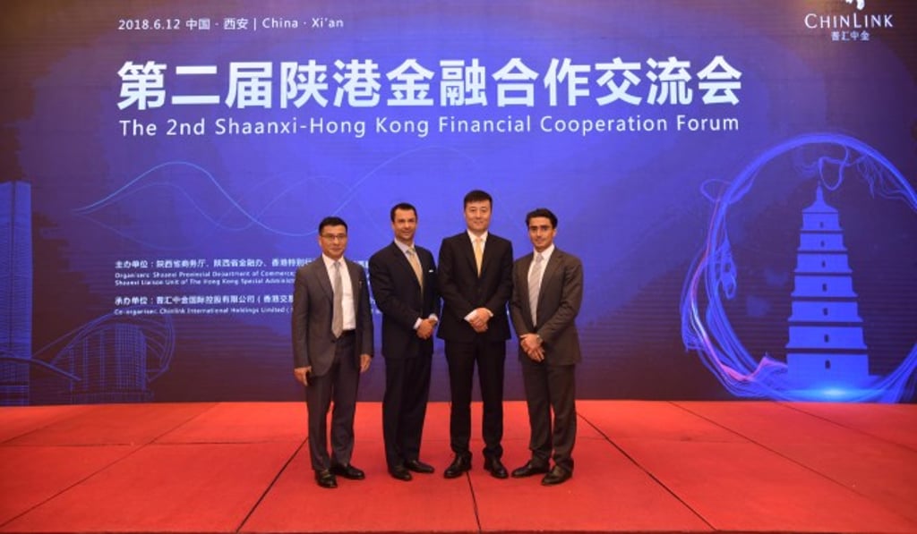 (From left to right) James Siu, executive director of Chinlink International Holdings Ltd, Adrian Valenzuela, co-founder of Hong Kong-based financial service firm MCM Partners, Li Weibin, chairman and managing director of Chinlink, and Rachid Bouzouba, co-founder of MCM Partners, at the second Shaanxi-Hong Kong Financial Cooperation Forum, which was held on June 12 in Xi’an.