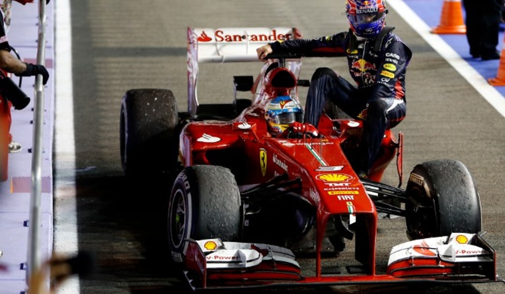 Mark Webber hitches a ride on board Fernando Alonso’s Ferrari