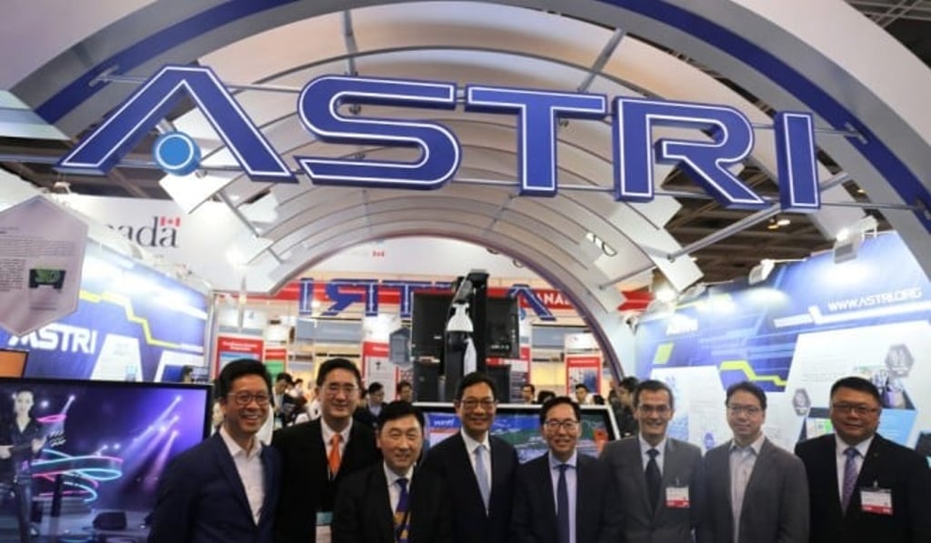 At ASTRI’s pavilion at the International ICT Expo 2018: (From left to right) Dr MeiKei Ieong – ASTRI’s CTO, Mr Bernard Chan – Under Secretary for Commerce and Economic Development of the HKSAR Government, Mr Benjamin Chau – Deputy Executive Director of HKTDC, Mr Wong Ming-yam – Chairman of ASTRI, Mr Chan Kin-por – HKSAR Legislative Councillor, Mr Hugh Chow – ASTRI’s CEO, Mr Charles Mok – HKSAR Legislative Councillor, and Dr Sunny Chai – Chairman of Hong Kong Science Park (Chairman of LSCM at that time)