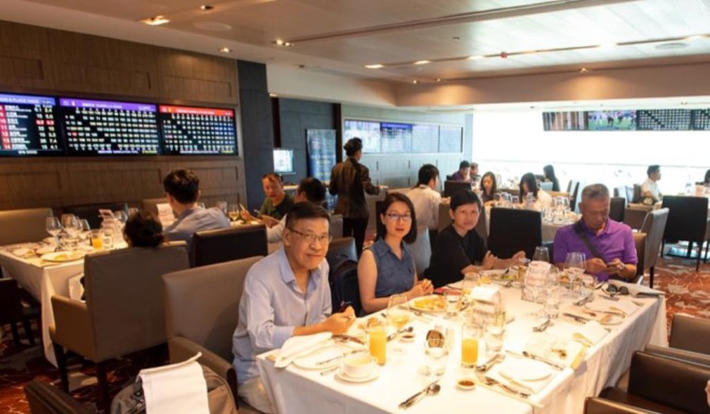 Members discussing the races.