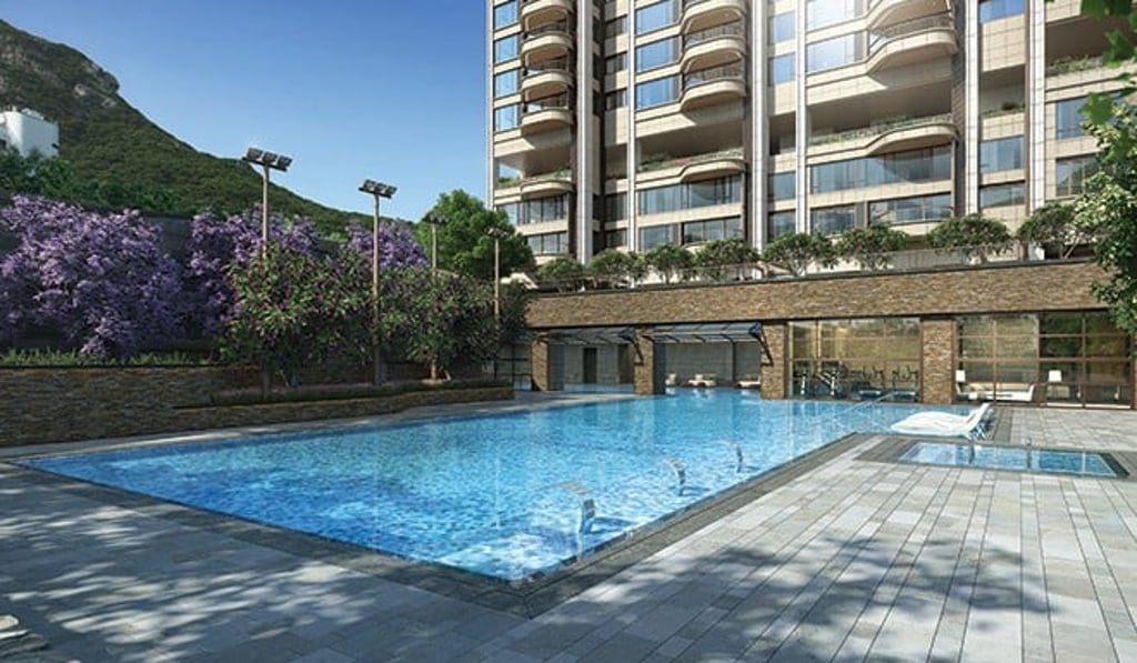 Rendering of the Development and swimming pools. The view shown above is based on a photo taken at the Development on 8 June 2017. #~∞