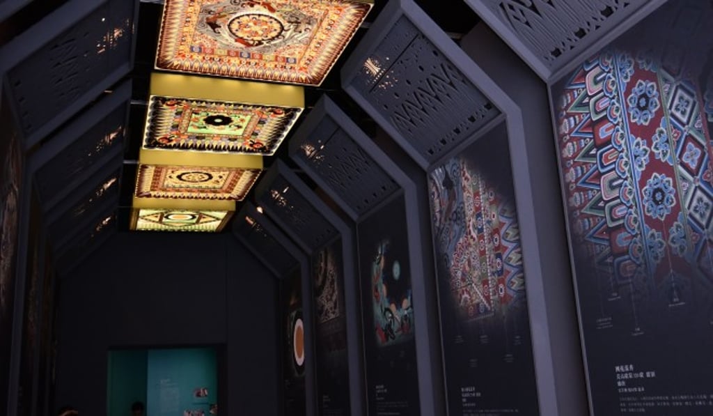 Caisson ceilings of Mogao caves displayed in the exhibition gallery. Caisson ceilings of Mogao caves displayed in the exhibition gallery.