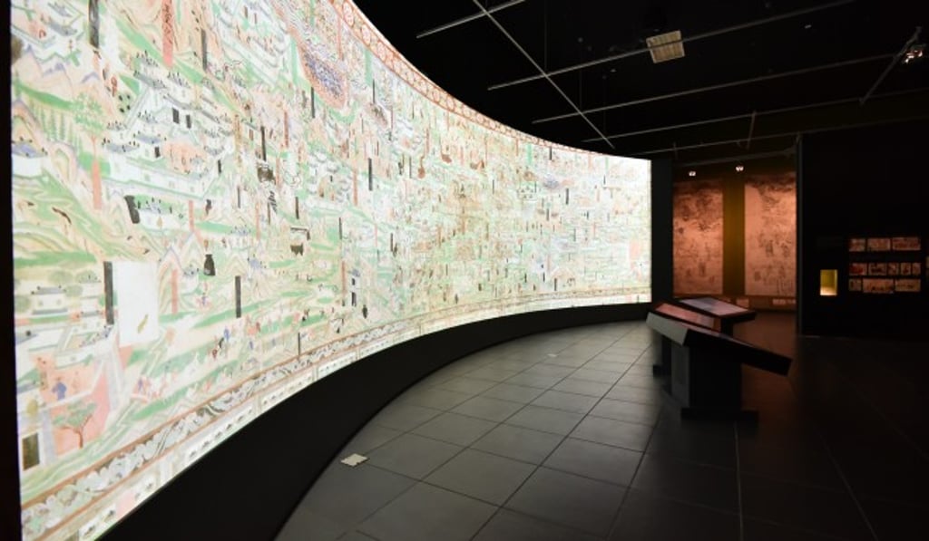 A huge digitised mural depicting Mount Wutai in cave 61 (Five Dynasties period). A huge digitised mural depicting Mount Wutai in cave 61 (Five Dynasties period).