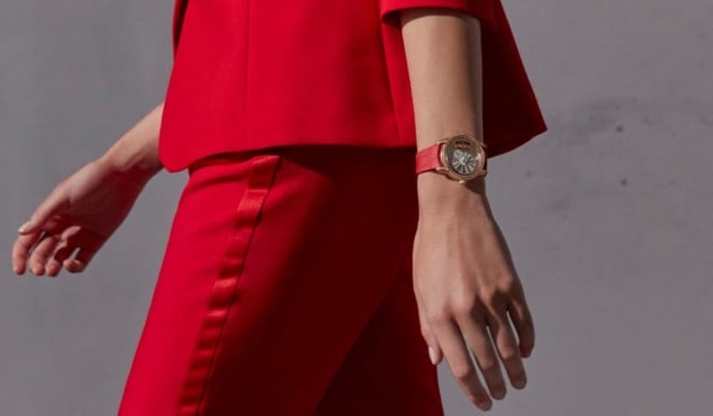 The Hand-Wound Millenary in 18-carat pink gold looks festive with a red alligator strap.