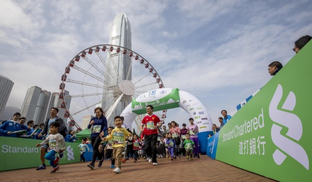 Up to 74,000 people will be taking part in a range of races, including a 1km ‘family run’ and wheelchair events, during this year’s Standard Chartered Hong Kong Marathon. Photo: Standard Chartered Hong Kong Marathon Up to 74,000 people will be taking part in a range of races, including a 1km ‘family run’ and wheelchair events, during this year’s Standard Chartered Hong Kong Marathon. Photo: Standard Chartered Hong Kong Marathon