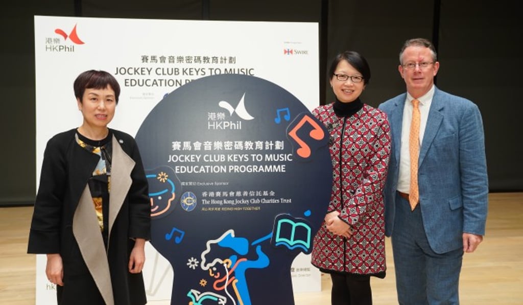 Mrs Angelina Cheung, Deputy Secretary for Home Affairs of the HKSAR (centre), Ms Winnie Yip, Executive Manager, Charities (Projects), The Hong Kong Jockey Club (left), and Mr Michael MacLeod, Chief Executive of the Hong Kong Philharmonic Orchestra officiate at the opening ceremony of the orchestra’s flagship music education initiative, ‘Jockey Club Keys to Music Education Programme’ 2018/19 season. Photo: Cheung Wai-lok