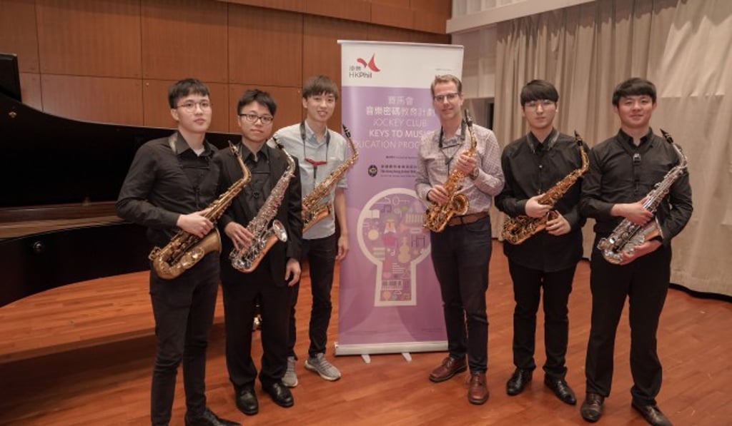 The HK Phil invites renowned musicians from around the world such as Grammy-winning saxophonist Timothy McAllister (pictured, middle), as well as the orchestra’s own principal players, to host instrumental masterclasses. Young musicians gain insights into performing technique from the professionals. Photo: Cheung Wai-lok