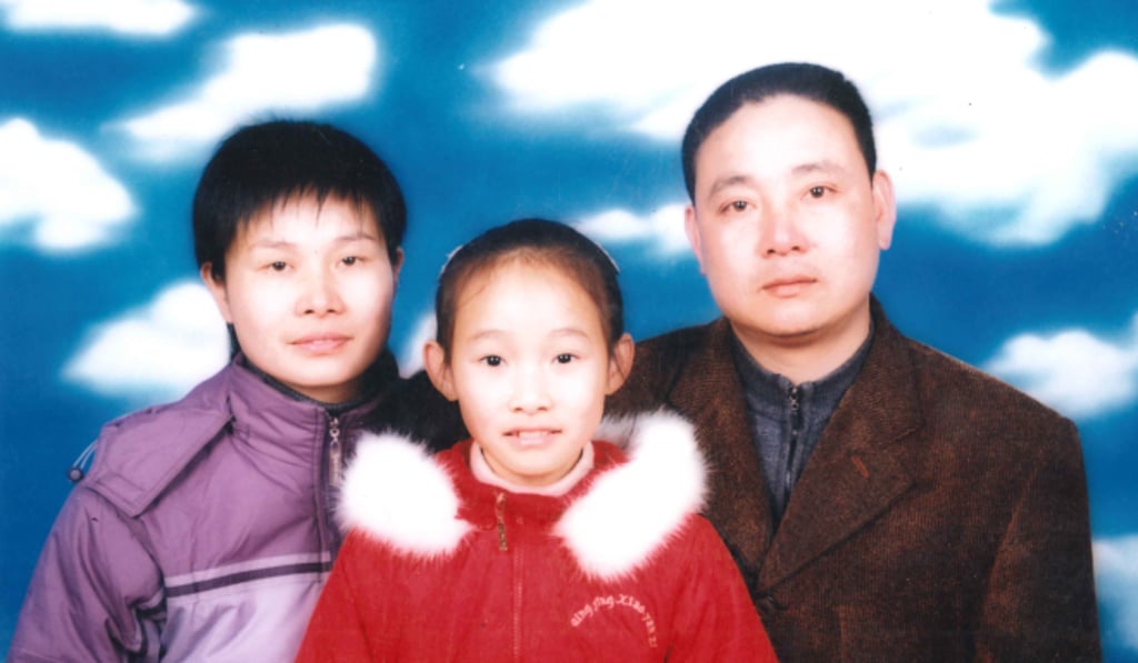 A very young Yang Yang with her parents. A very young Yang Yang with her parents.