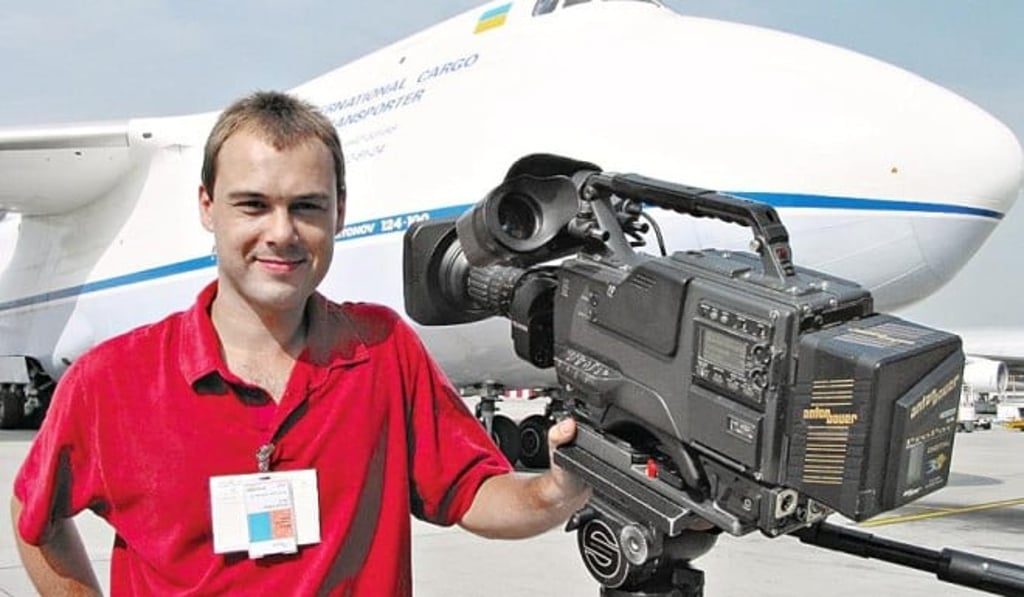 Moray Wedderburn's cameras are a lot smaller now, but it's still a chore to carry all his equipment around.