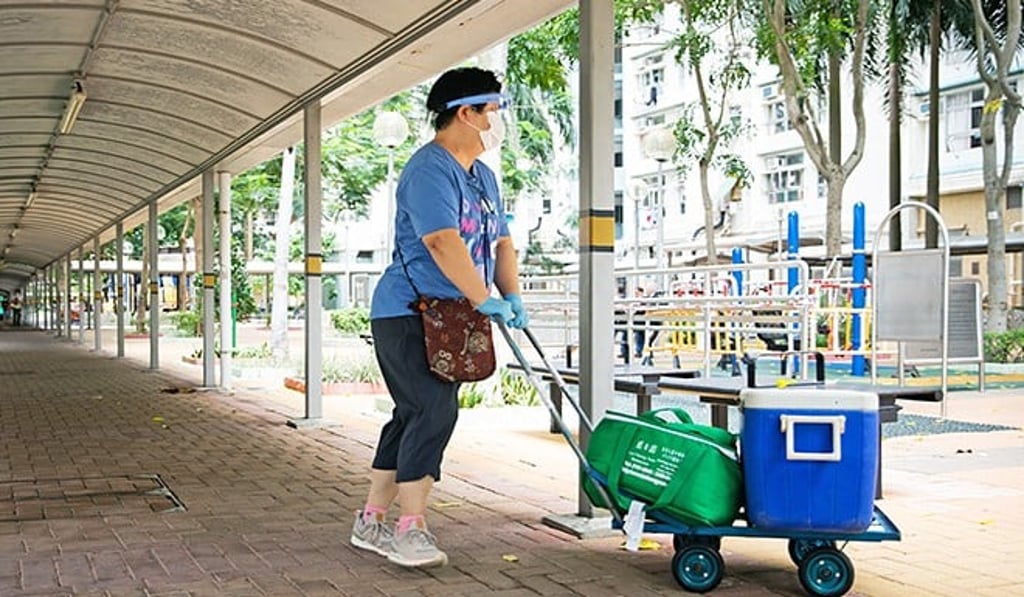 At 63, Ms Wong finds contentment through delivering fresh food packs to those in need.