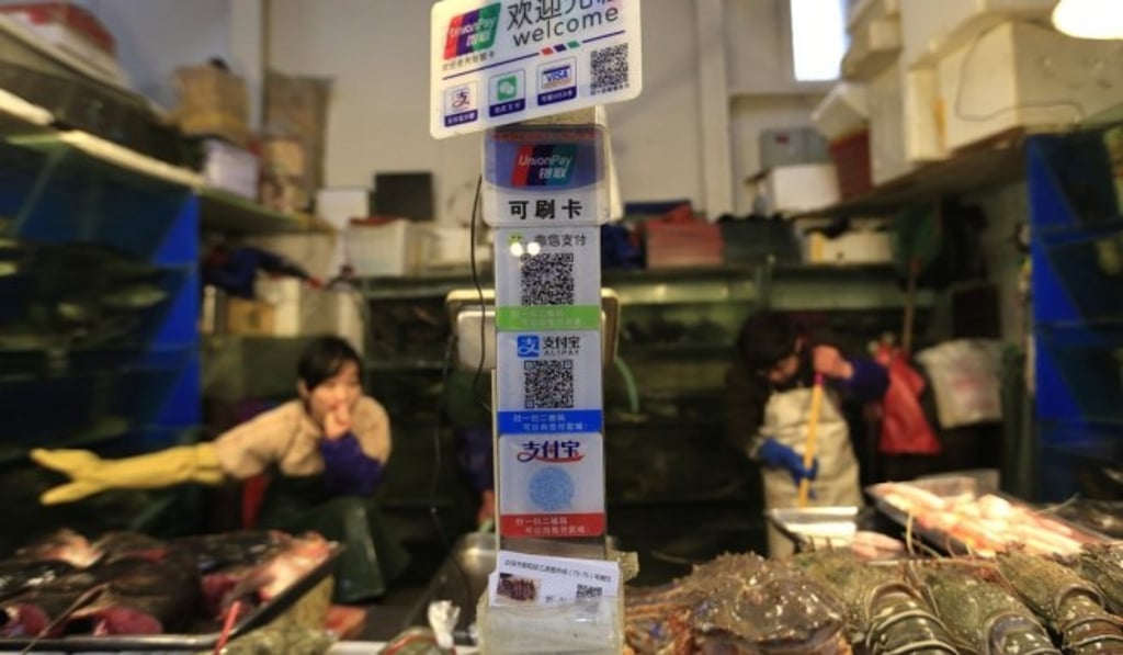 Alibaba’s Alipay and Tencent’s WeChat Pay are already popular payment methods in China. Photo: EPA