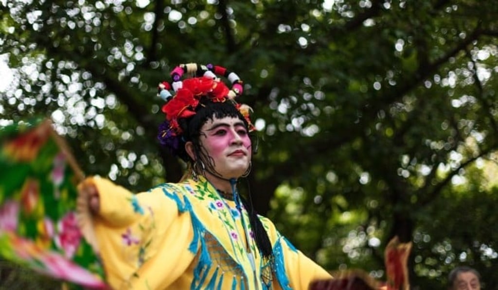 A transgender woman dances in Lianhuashan Park. Shenzhen. While China doesn’t recognise LGBTQ people, and restricts freedom of expression about LGBTQ people, same-sex couples find ways to gain legal protection, a global report notes. Photo: Emeric Fohlen/NurPhoto via Getty Images A transgender woman dances in Lianhuashan Park. Shenzhen. While China doesn’t recognise LGBTQ people, and restricts freedom of expression about LGBTQ people, same-sex couples find ways to gain legal protection, a global report notes. Photo: Emeric Fohlen/NurPhoto via Getty Images