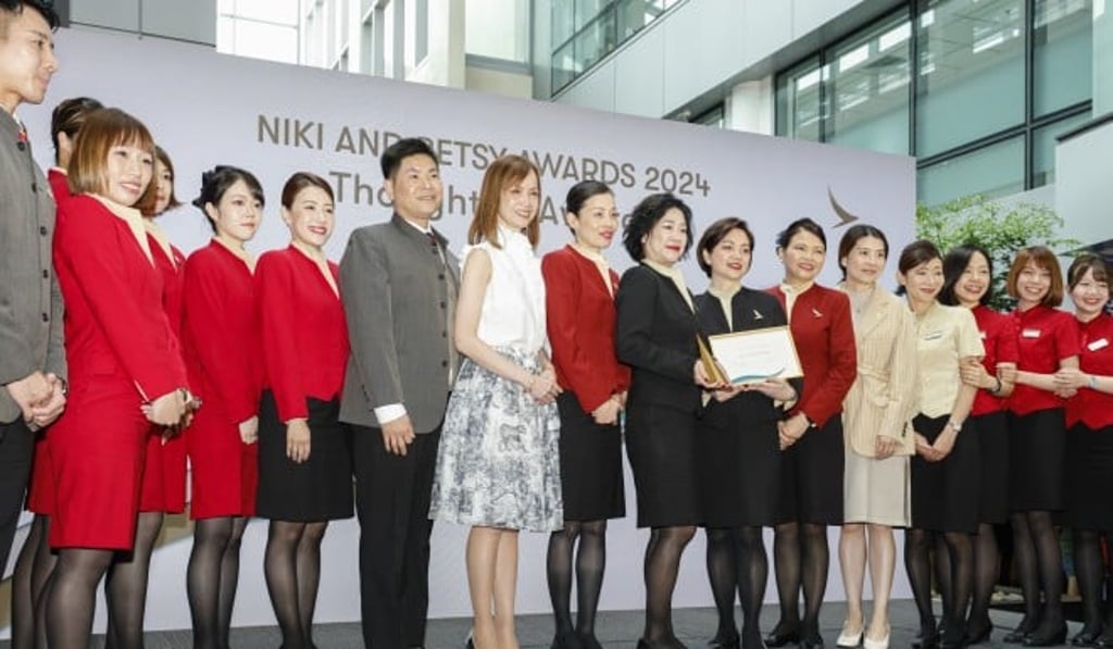 Lavinia Lau (eighth from left), Cathay Chief Customer and Commercial Officer, and Joanna Lai (fifth from right), Cathay Group General Counsel and Company Secretary, presented the Thoughtful Award to the Inflight Service Team, who played a pivotal role in saving the life of an unwell passenger on flight CX764 in February 2023. Lavinia Lau (eighth from left), Cathay Chief Customer and Commercial Officer, and Joanna Lai (fifth from right), Cathay Group General Counsel and Company Secretary, presented the Thoughtful Award to the Inflight Service Team, who played a pivotal role in saving the life of an unwell passenger on flight CX764 in February 2023.