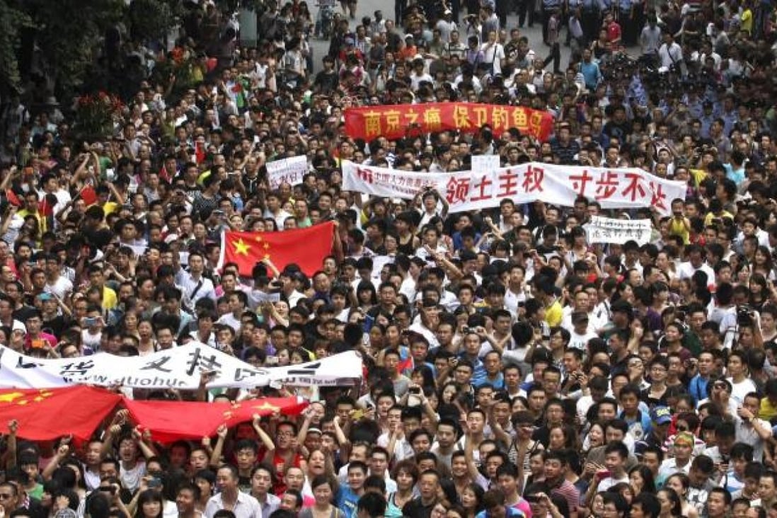 The central government has been tolerant of the anti-Japan protests since activists set foot on the Diaoyus, including this demonstration yesterday in Chengdu, Sichuan. Photo: AP