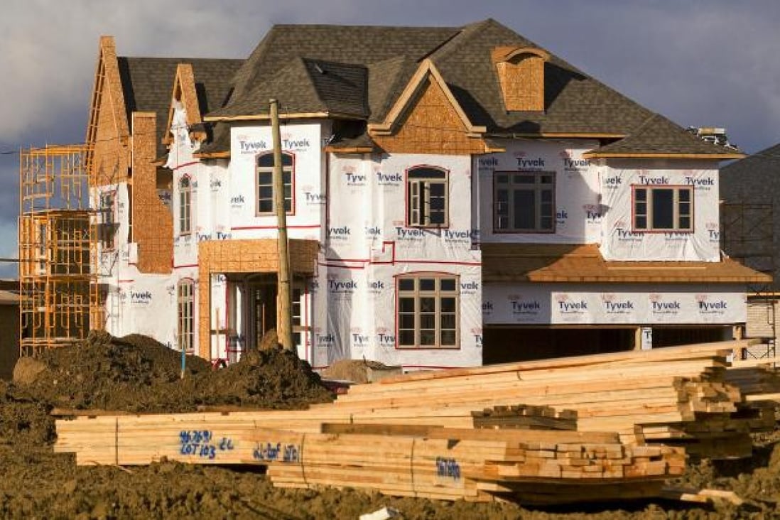 A house under construction in a Toronto suburb. The price of homes rose in most Canadian cities in the second quarter. Photo: Bloomberg