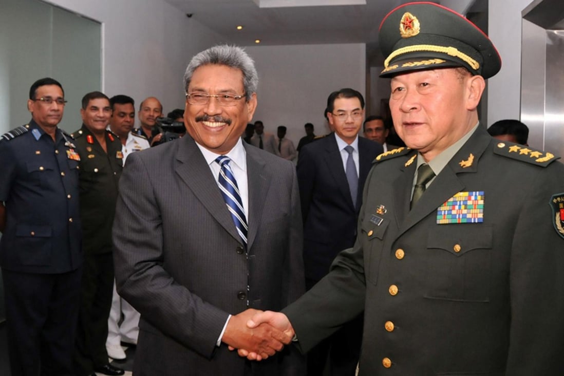 Defence Minister General Liang Guanglie shakes hands with Sri Lankan Defence Secretary Gotabhaya Rajapakse. Photo: AFP