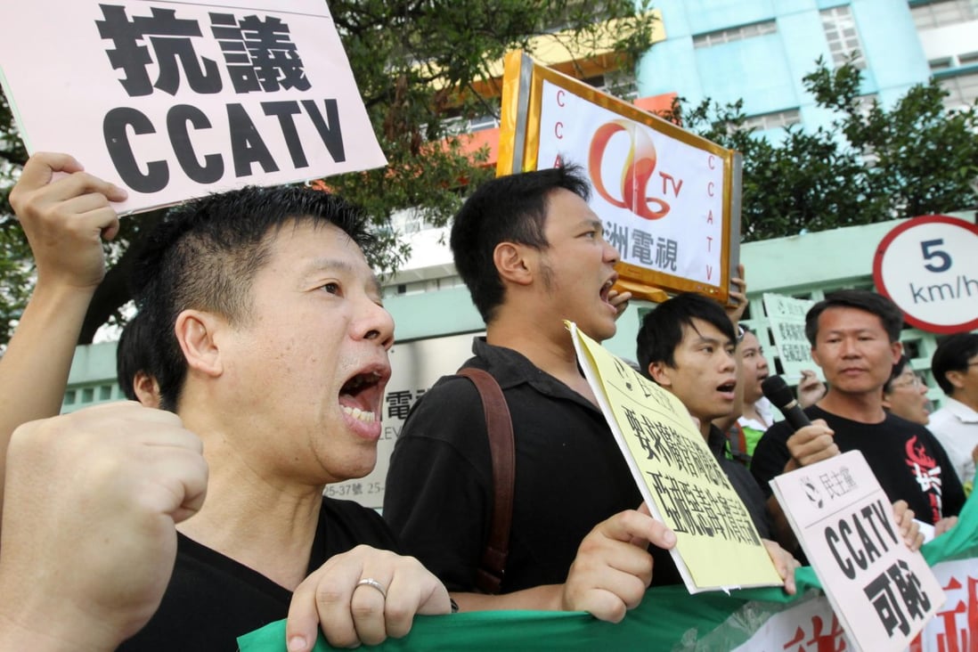Democratic Party protesters voice their discontent outside ATV's office in Tai Po. Photo: Edward Wong